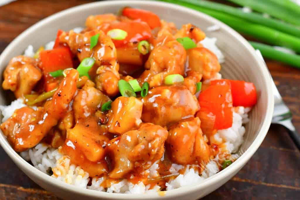 top view of sweet and sour chicken over rice