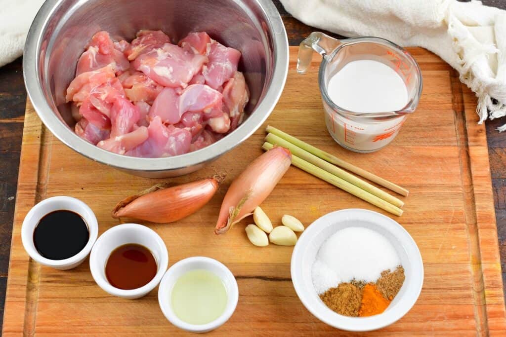 ingredients for chicken satay on the cutting board