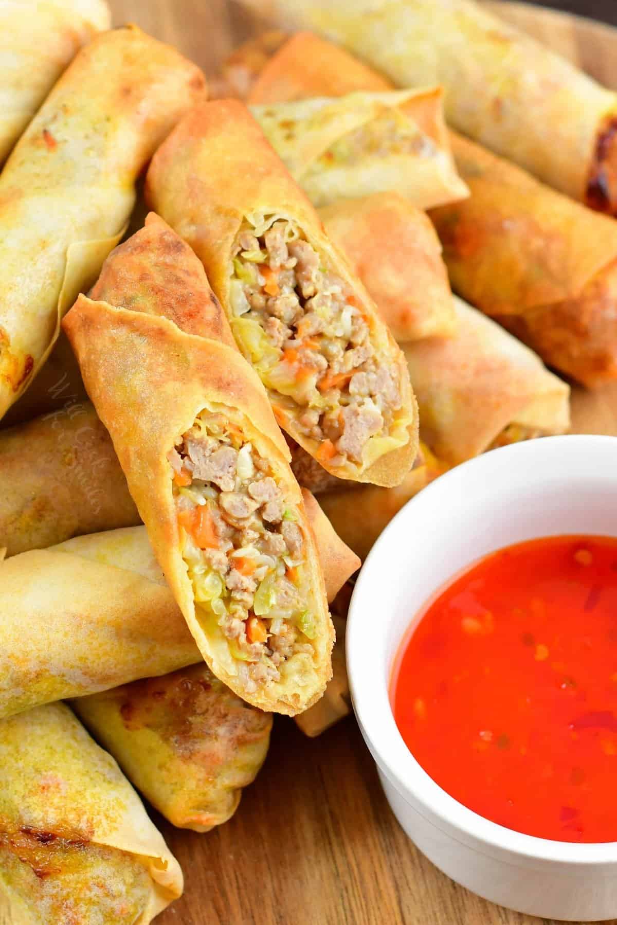 cut Thai spring roll on layer of spring rolls