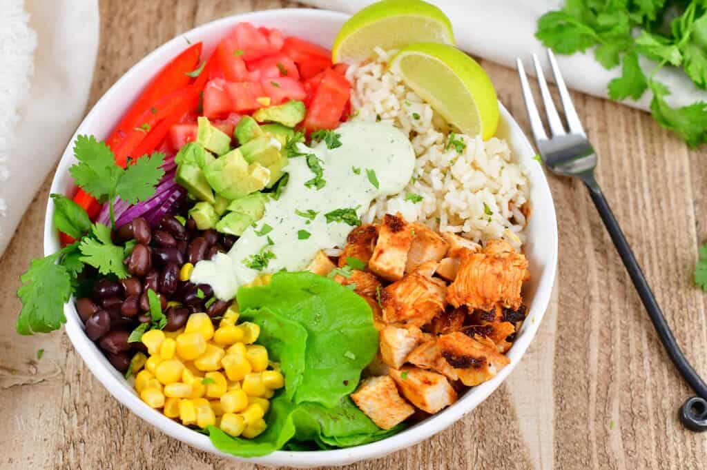 closeup of chicken burrito bowl in a white bowl