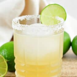 margarita cocktail in a rocks glass with salt and lime