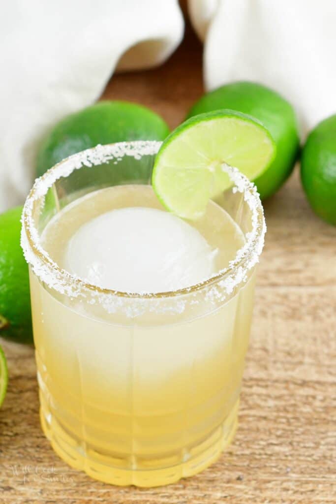 top view of margarita in a glass with round ice cube