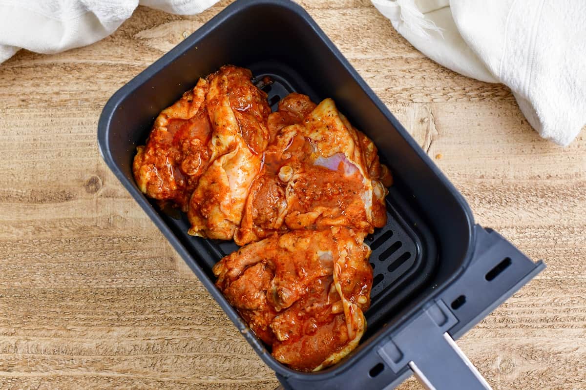 marinated chicken thighs in air fryer basket