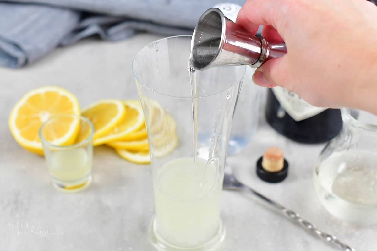Adding simple syrup to the cocktail