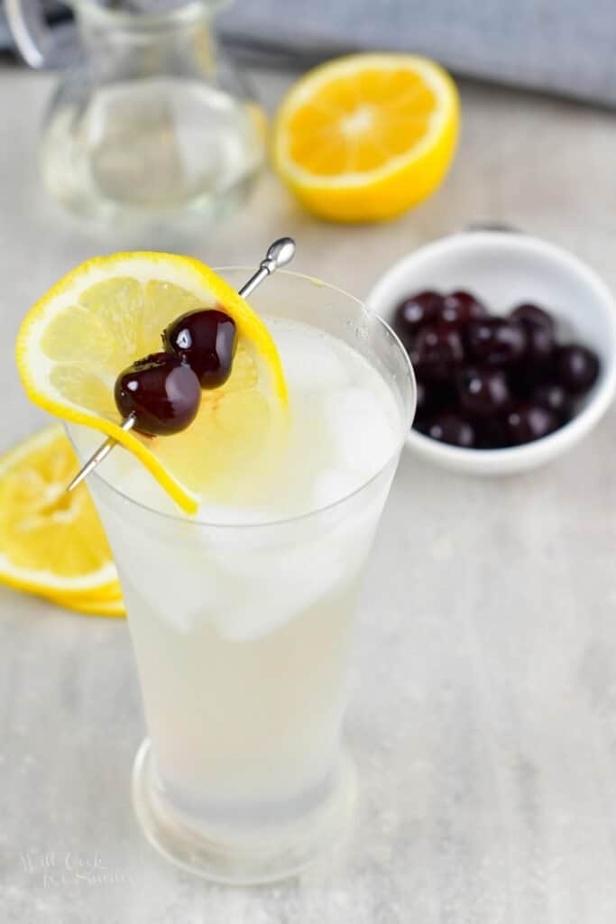 top view of the Tom Collins cocktail with lemon and cherry