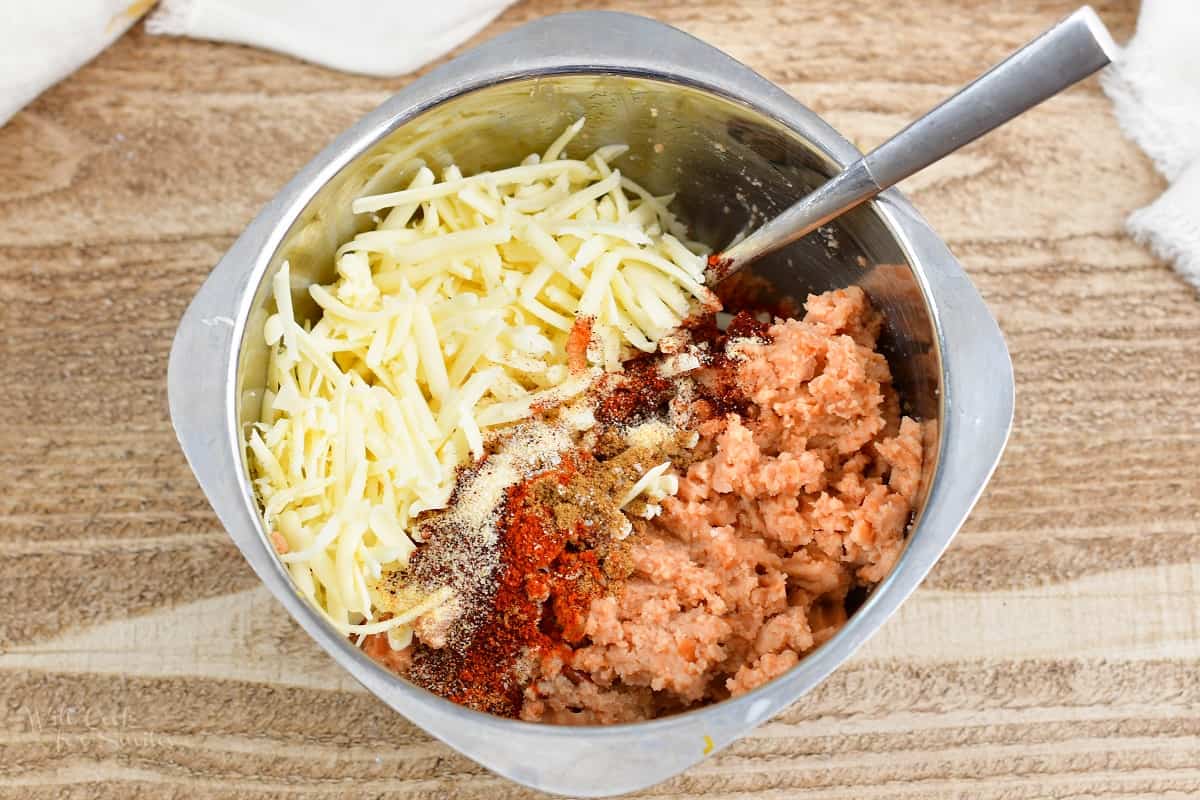 mixture for refried bean in a mixing bowl