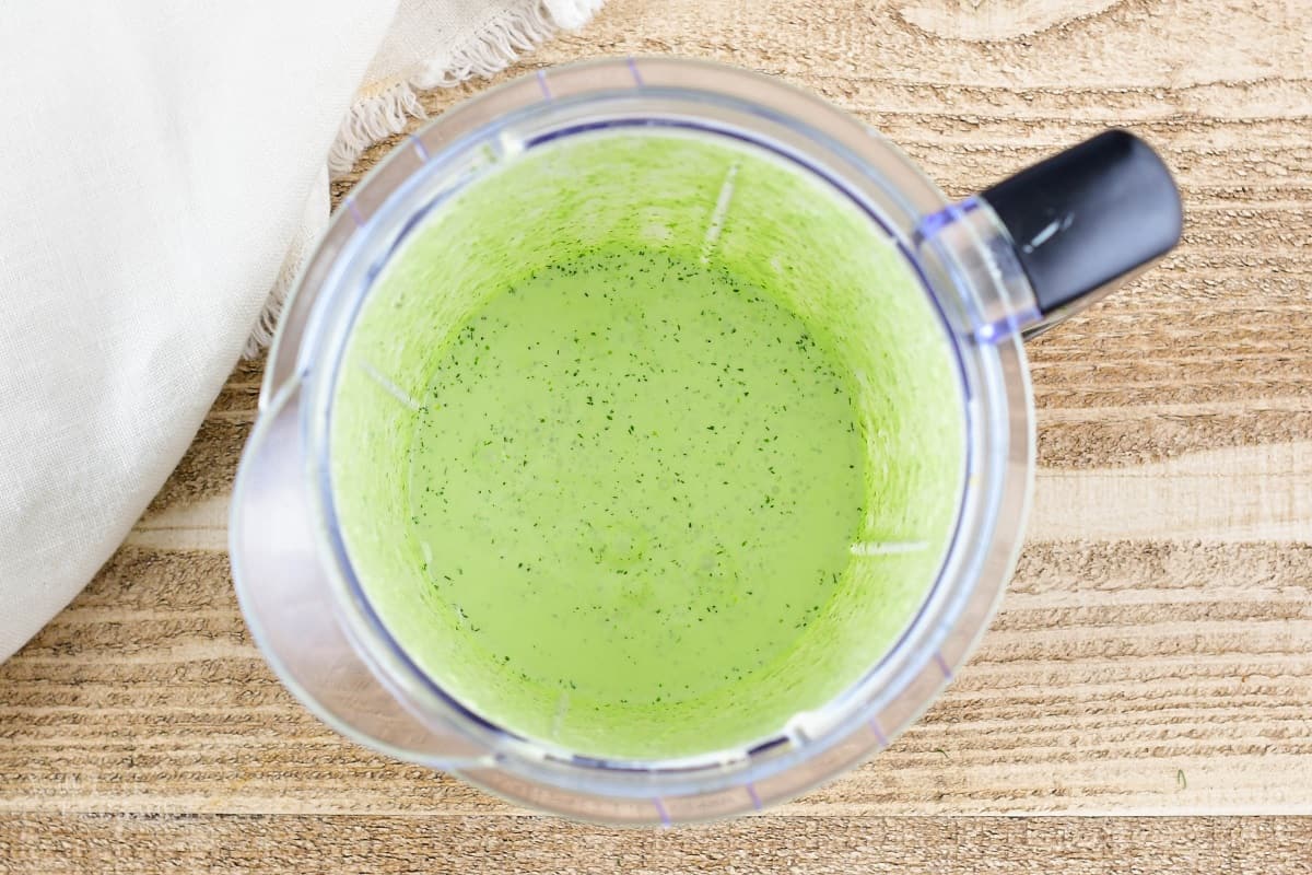 blended creamy green dressing in the blender