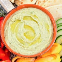 top view of the white bean dip in a bowl with dippings