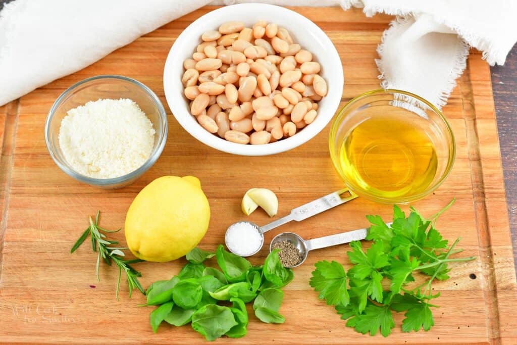 ingredients for white bean dip on the board