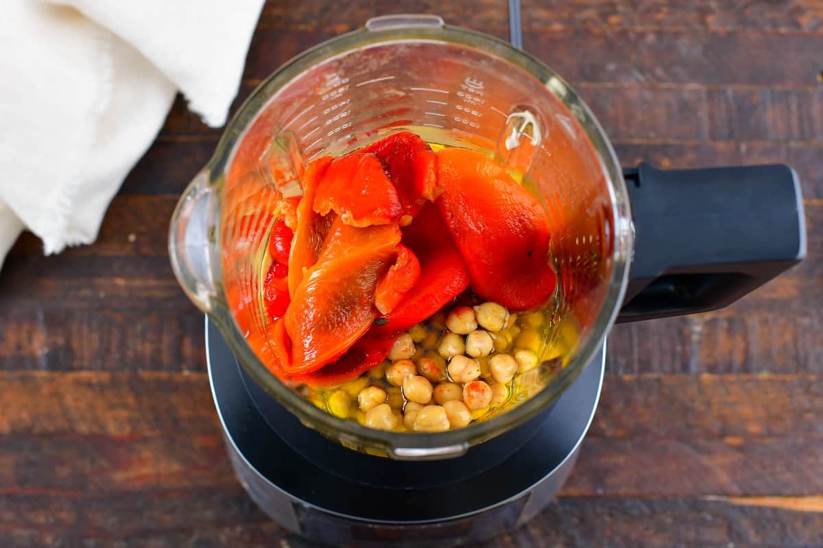 ingredients for roasted pepper hummus in a blender