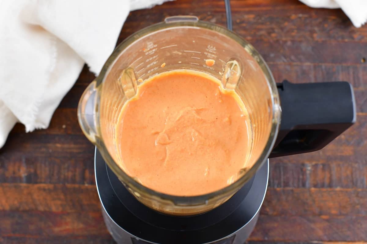 blended hummus in a blender