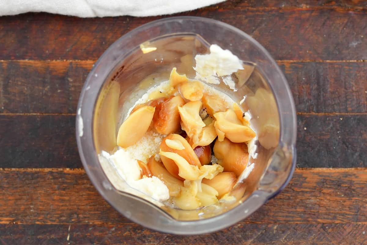 ingredients for aioli in a blender bowl before blending