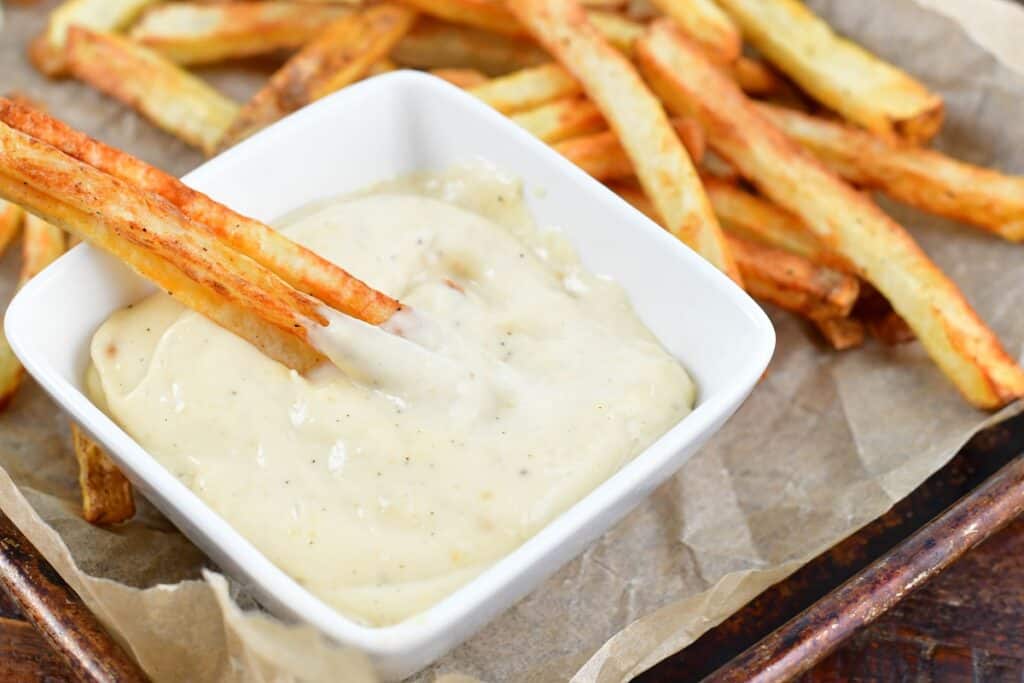 fried dipped in aioli on a bowl