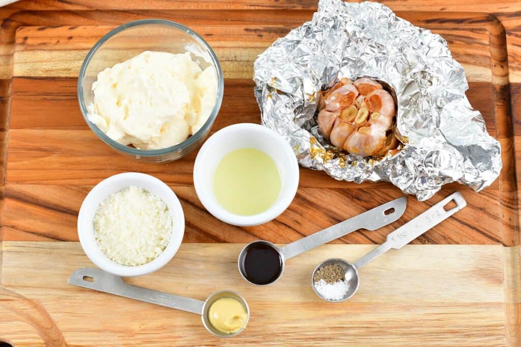 ingredients for roasted garlic aioli on the wooden board