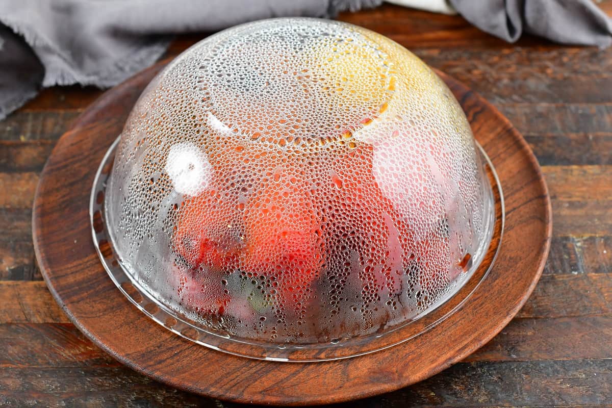 roasted peppers steaming under the cloche