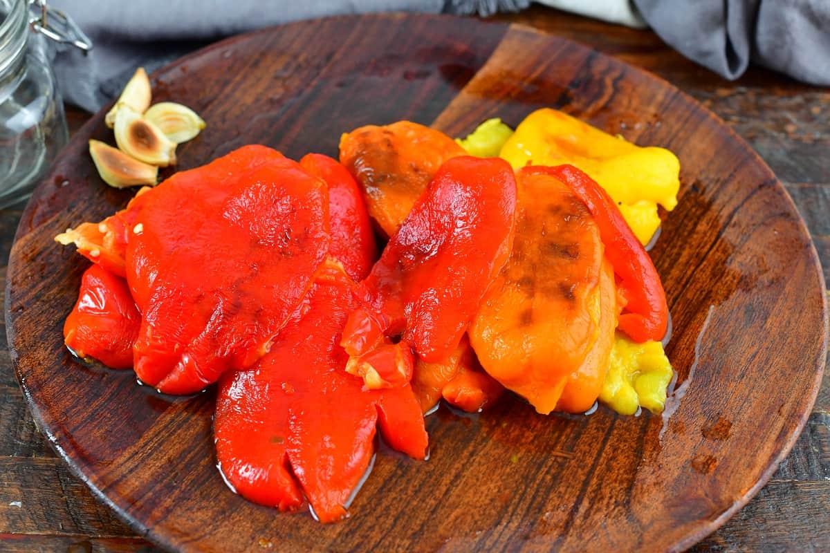 peeled and seeded roasted peppers in the plate