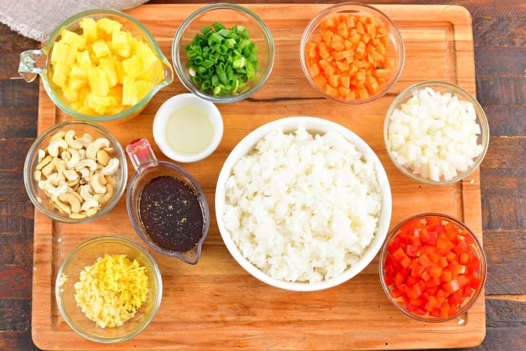 ingredients for pineapple fried rice on the board