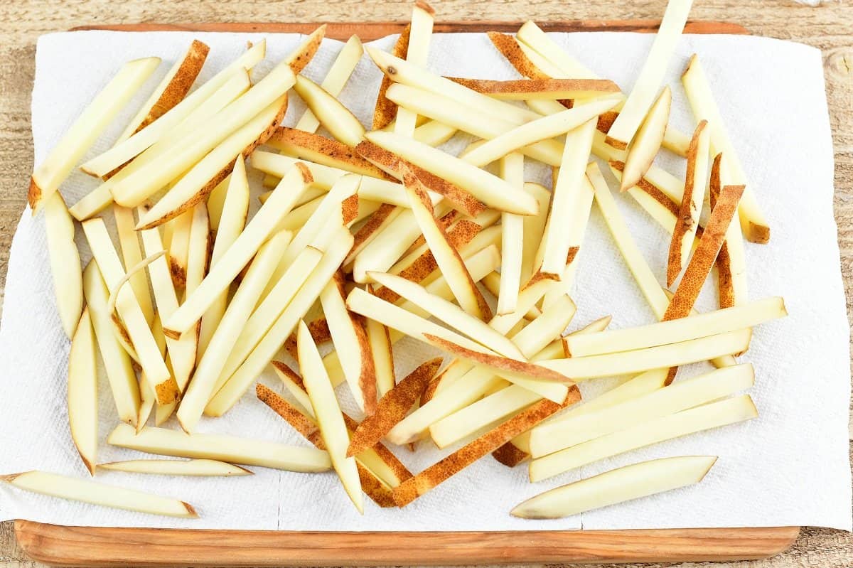 sliced potatoes into straws on the paper towel