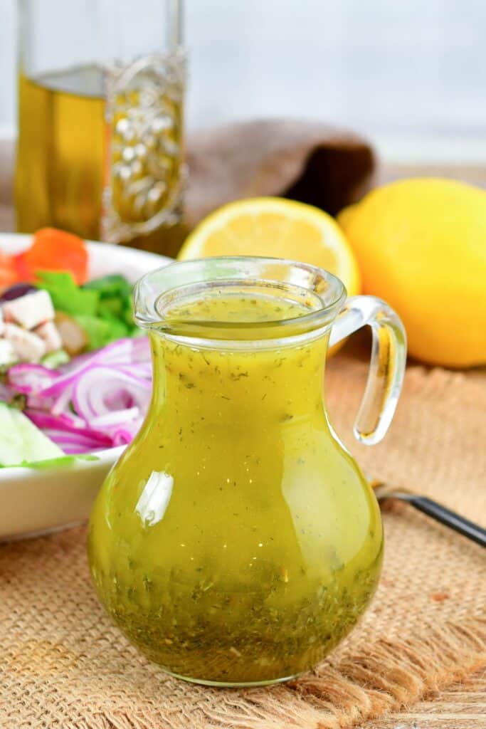 front view of Greek salad dressing in glass jar