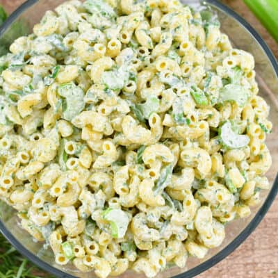 squared close up image of green macaroni salad