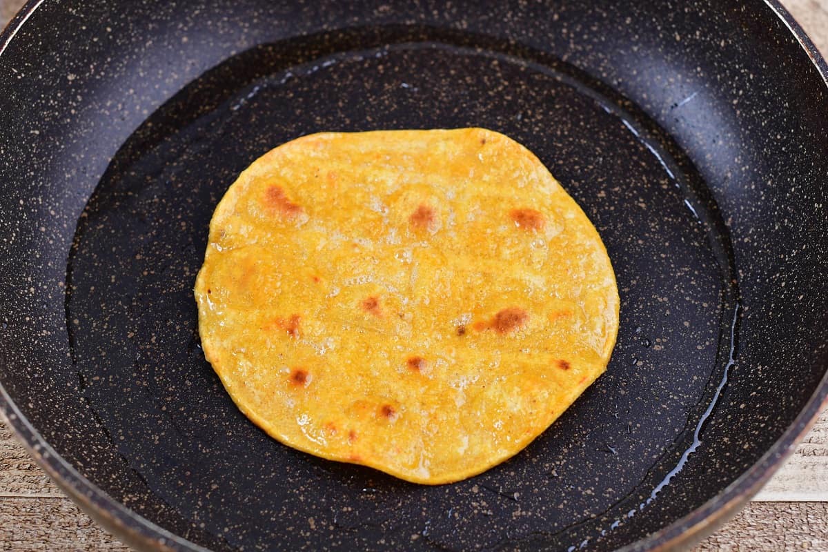 cooking tortillas in the cooking pan