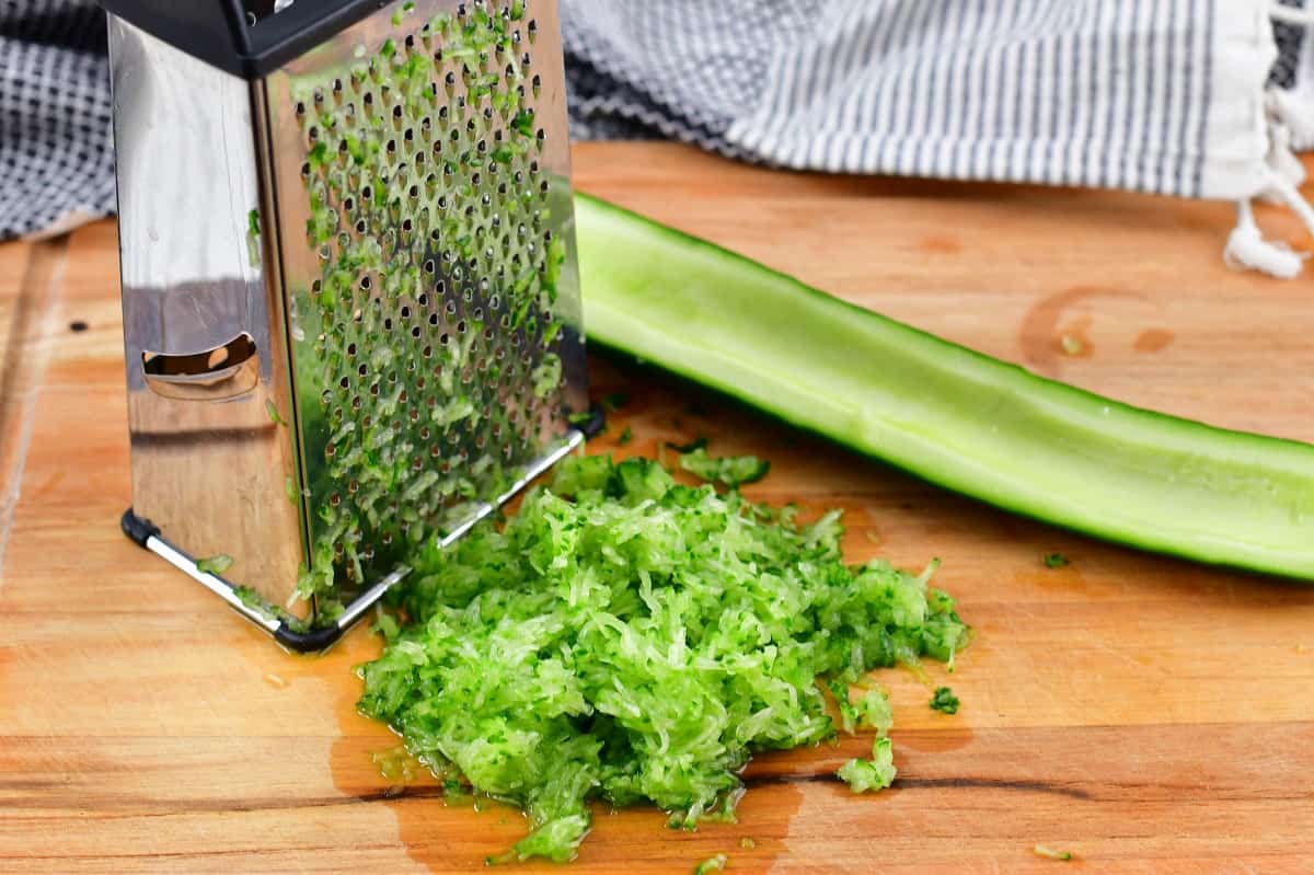 grated cucumber next to the cheese grater