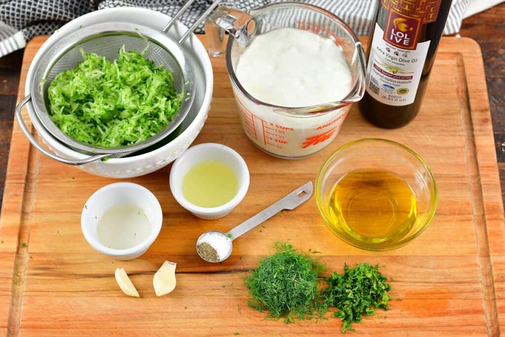 ingredients for tzatziki sauce on the board