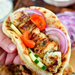 grilled chicken souvlaki in a pita with veggies