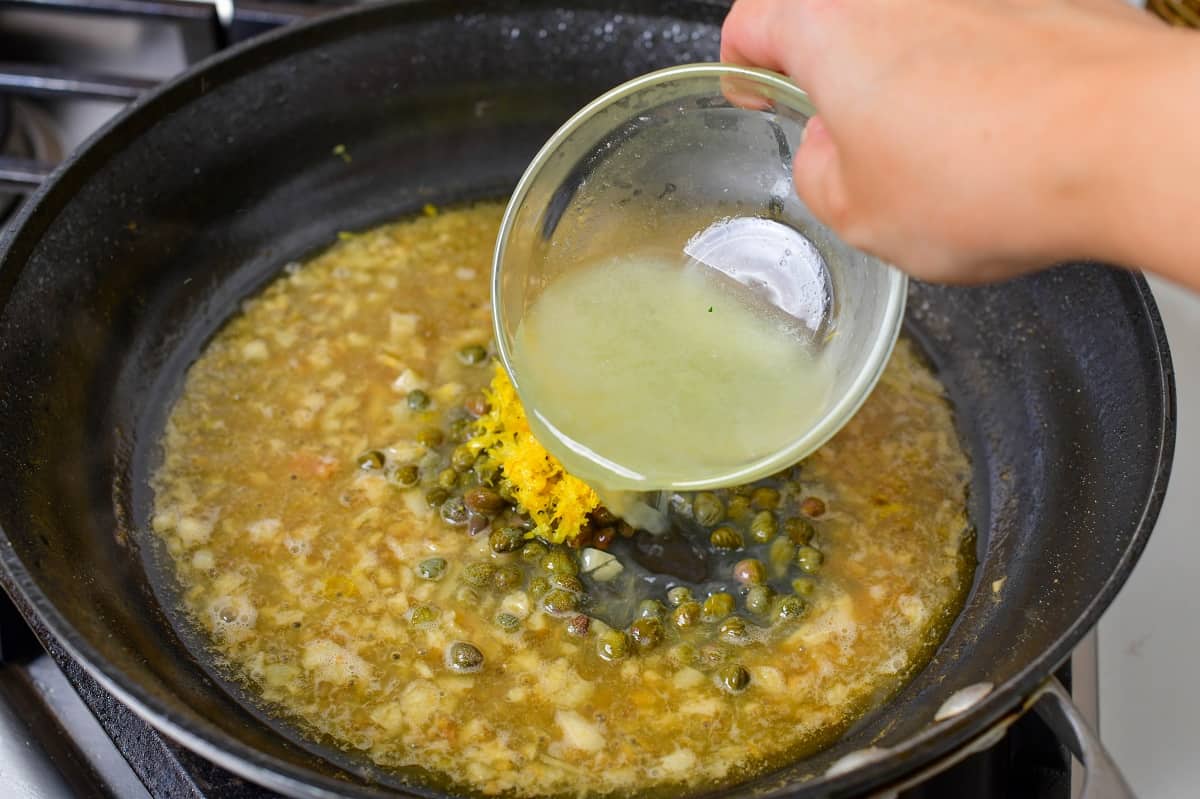 adding lemon juice capers and lemon zest