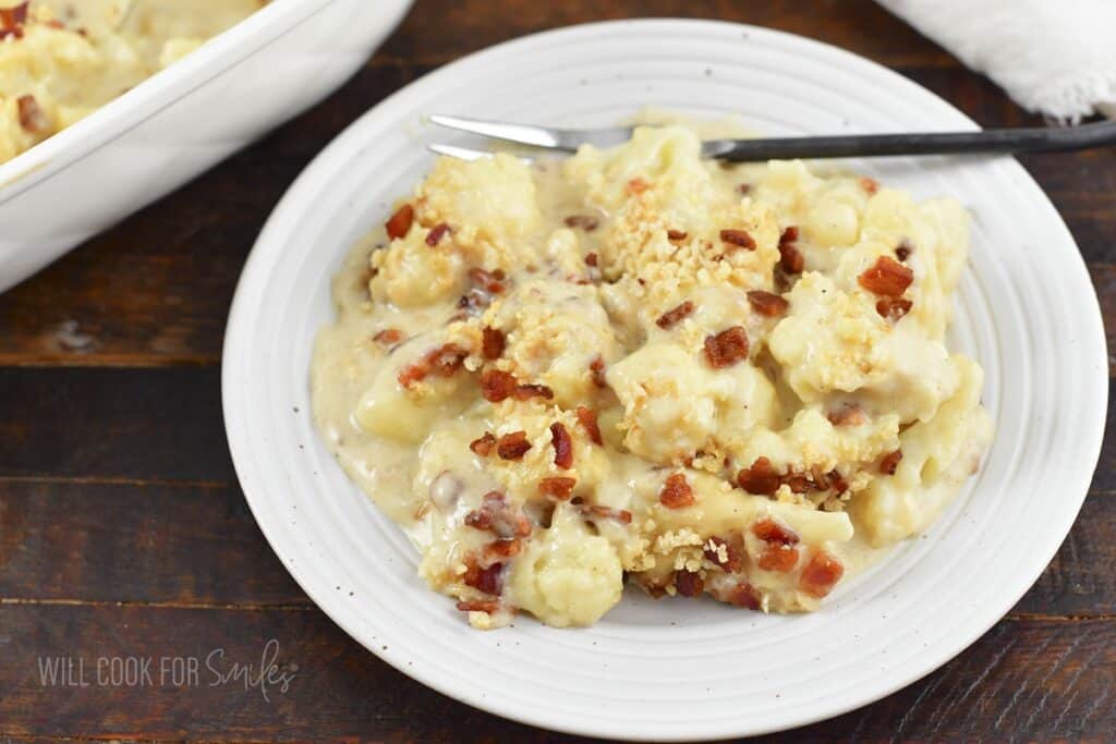 closeup of cauliflower casserole in a plate with a fork.