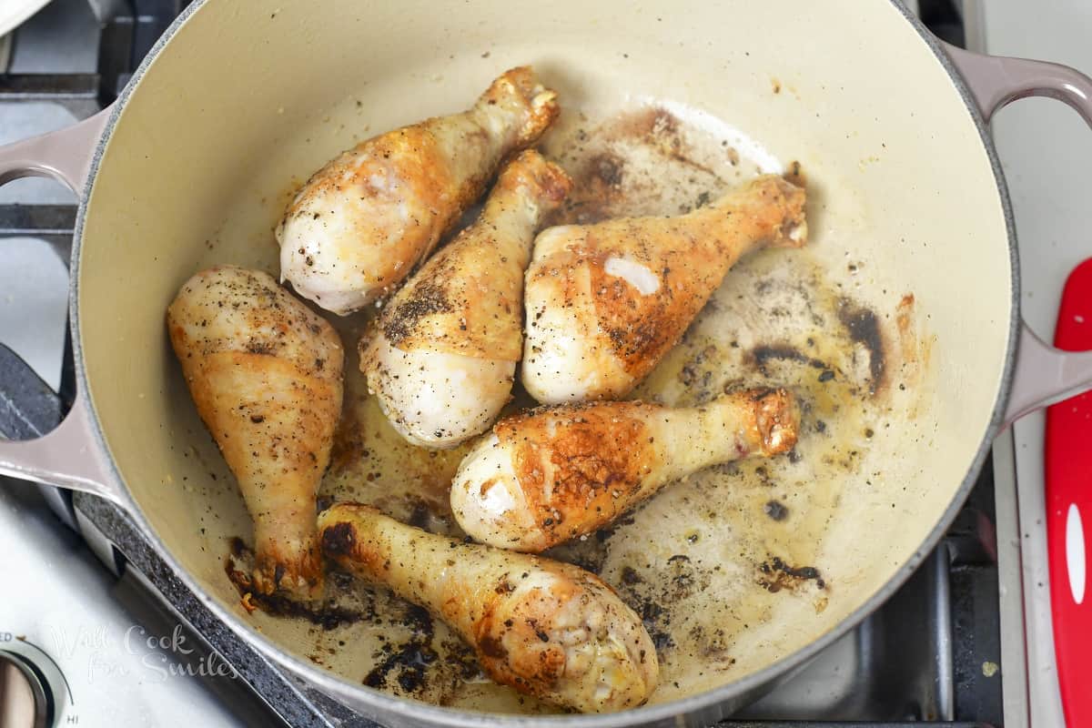 searing chicken drumsticks in a Dutch oven