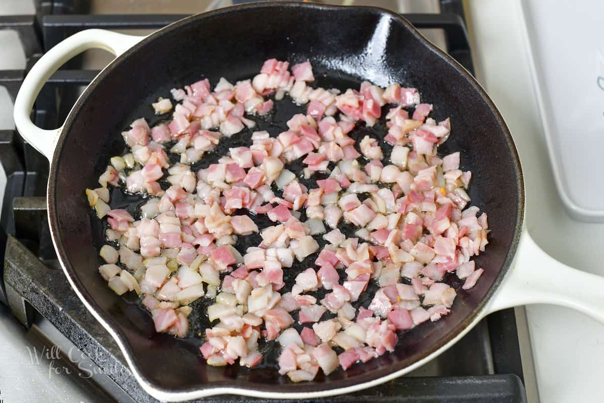 sautéing pancetta in a pan