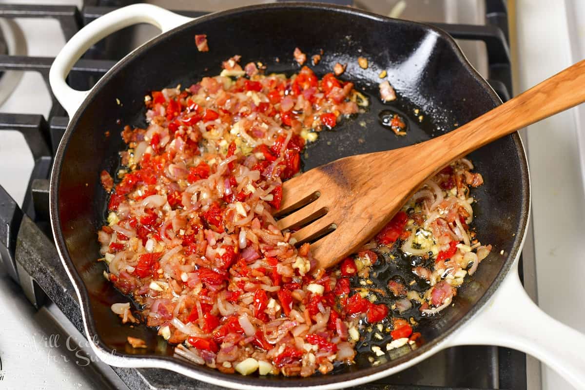 sautéed vegetables and pancetta in the pan