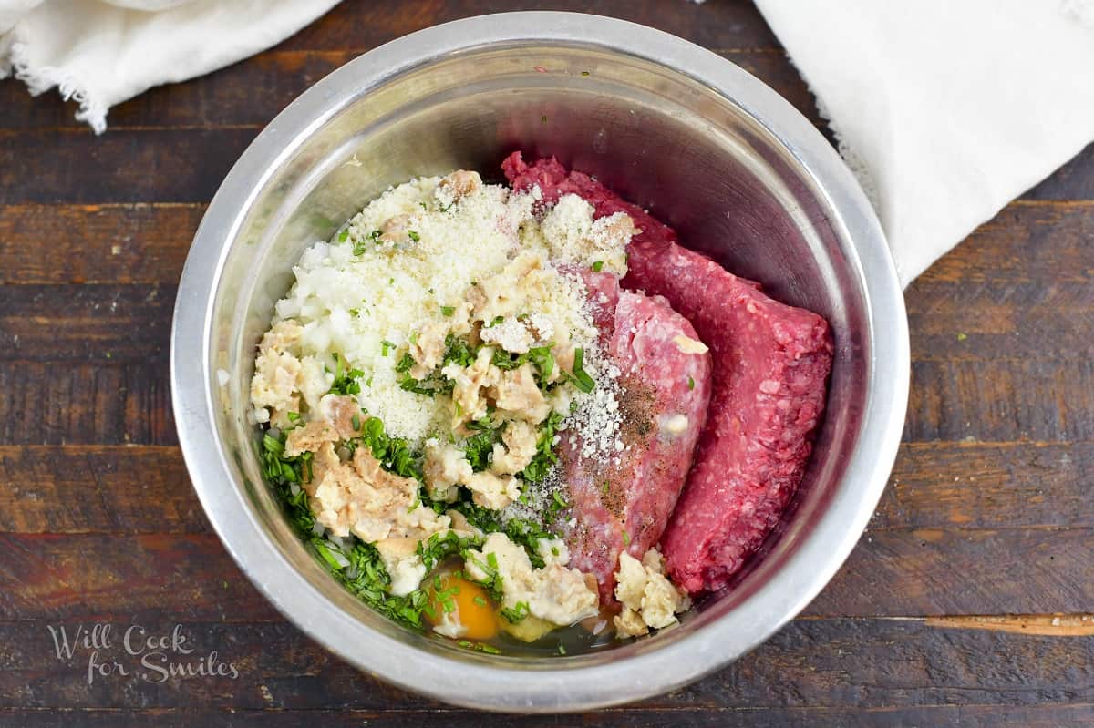 ingredients for the meatballs in the mixing bowl