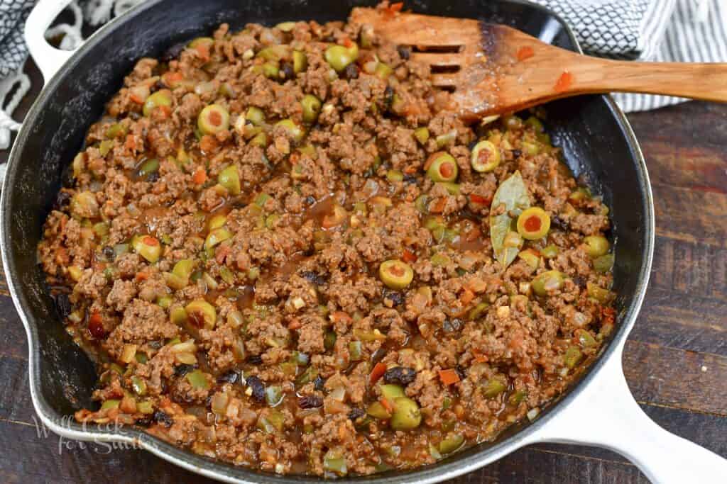 cooked picadillo in the cast iron pan