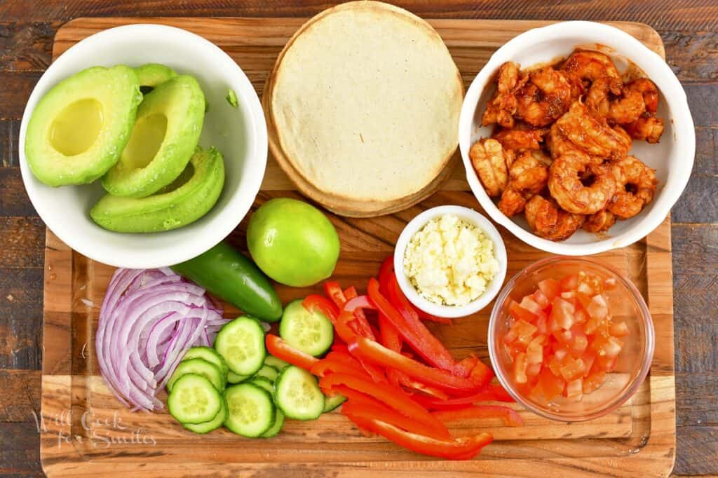 ingredients to build tostadas in the board