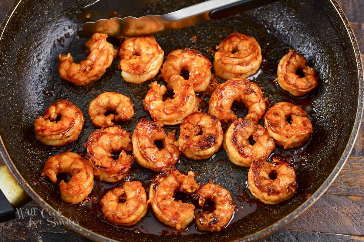 seared marinated shrimp in a pan