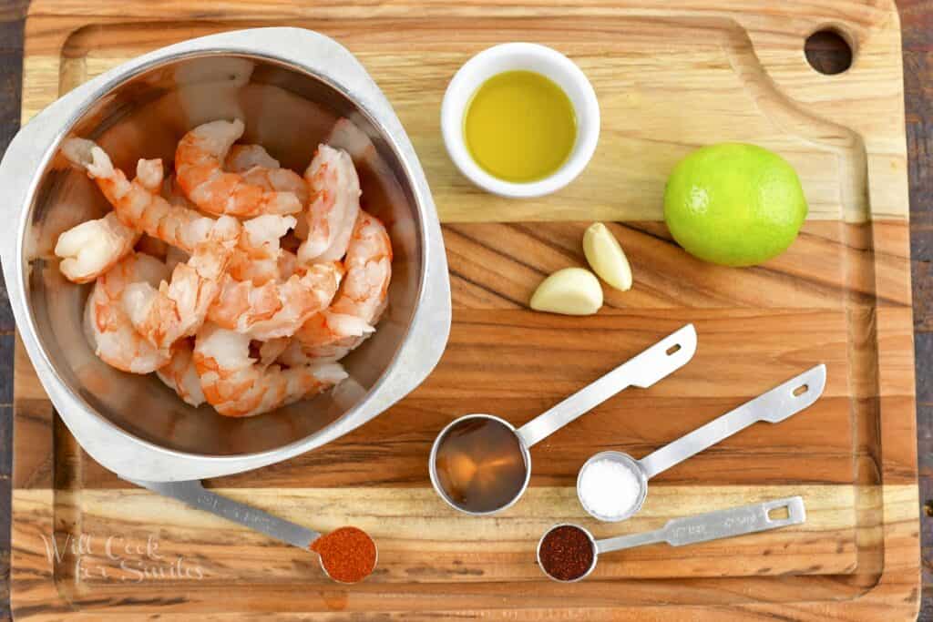 ingredients to marinate the shrimp on the board