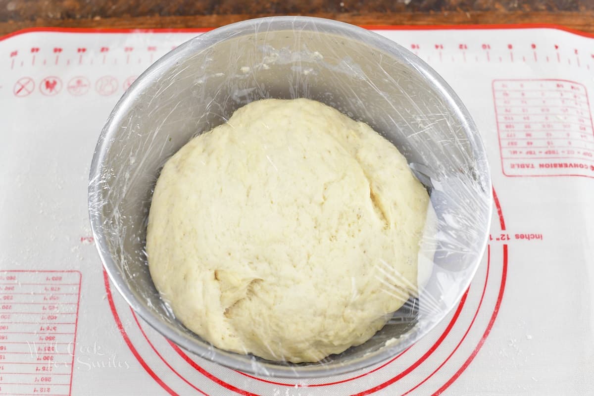 raised dough in the bowl.
