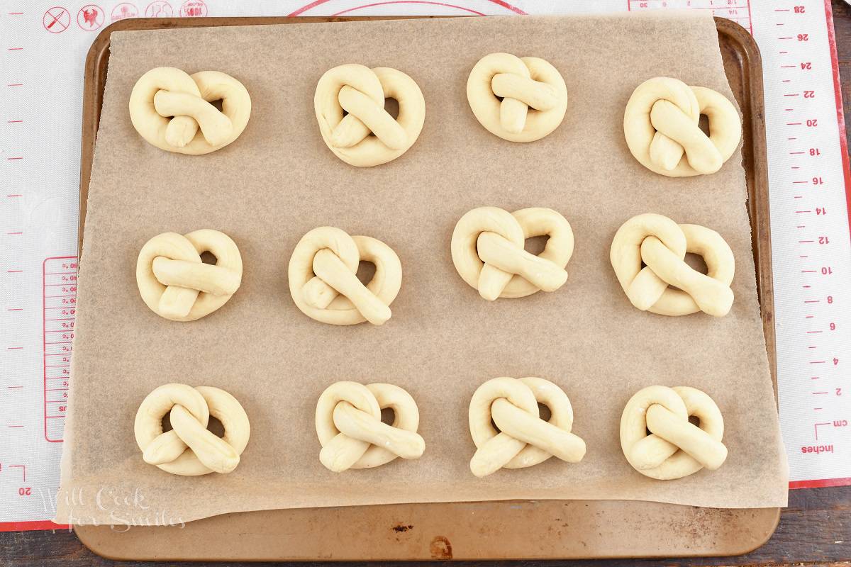 twisted pretzels on baking sheet.