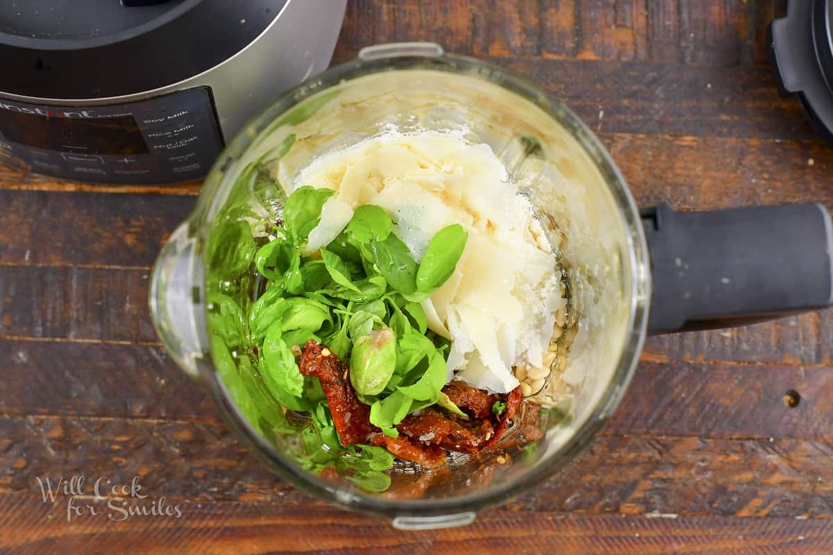 combined ingredients for tomato pesto in a blender
