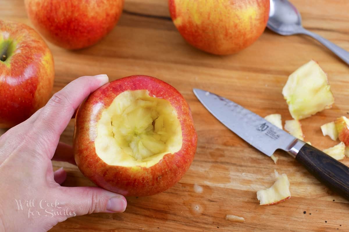 coring the apple with a pairing knife