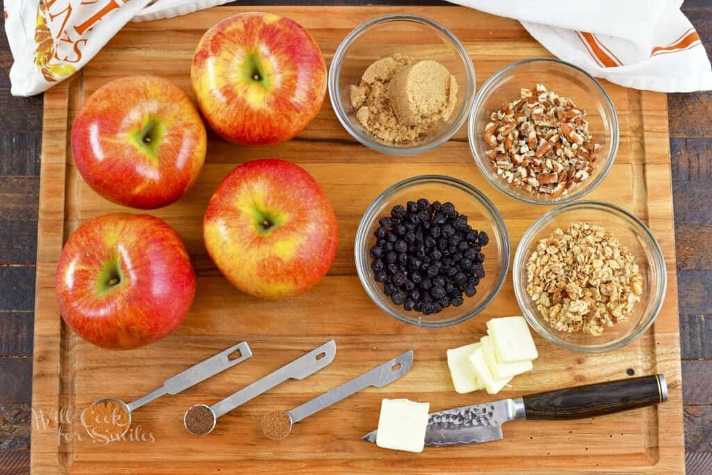 ingredients for baked apples on the cutting board