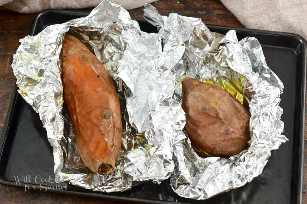 two large baked sweet potatoes baked in foil