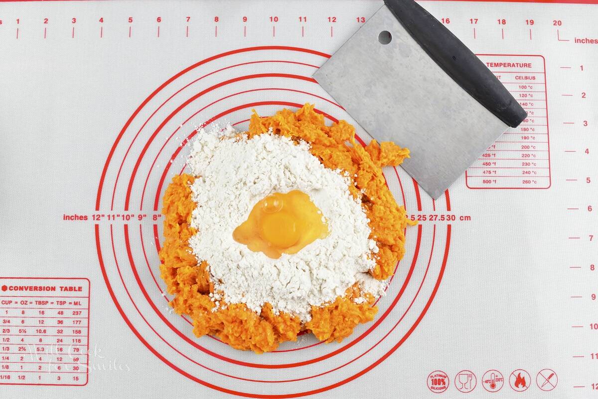 mashed sweet potato in a mount with flour and egg