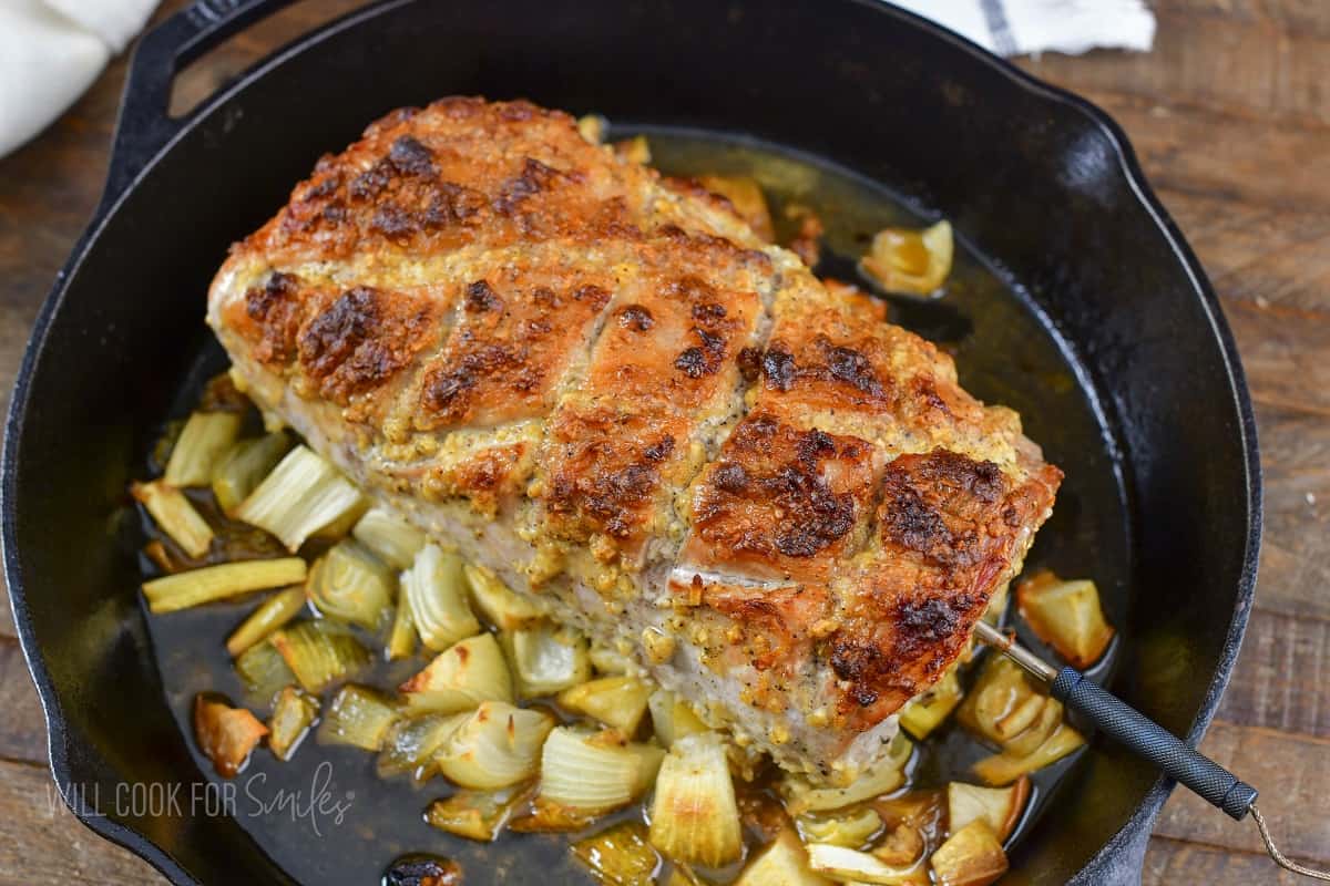 cooked pork loin roast in the skillet.