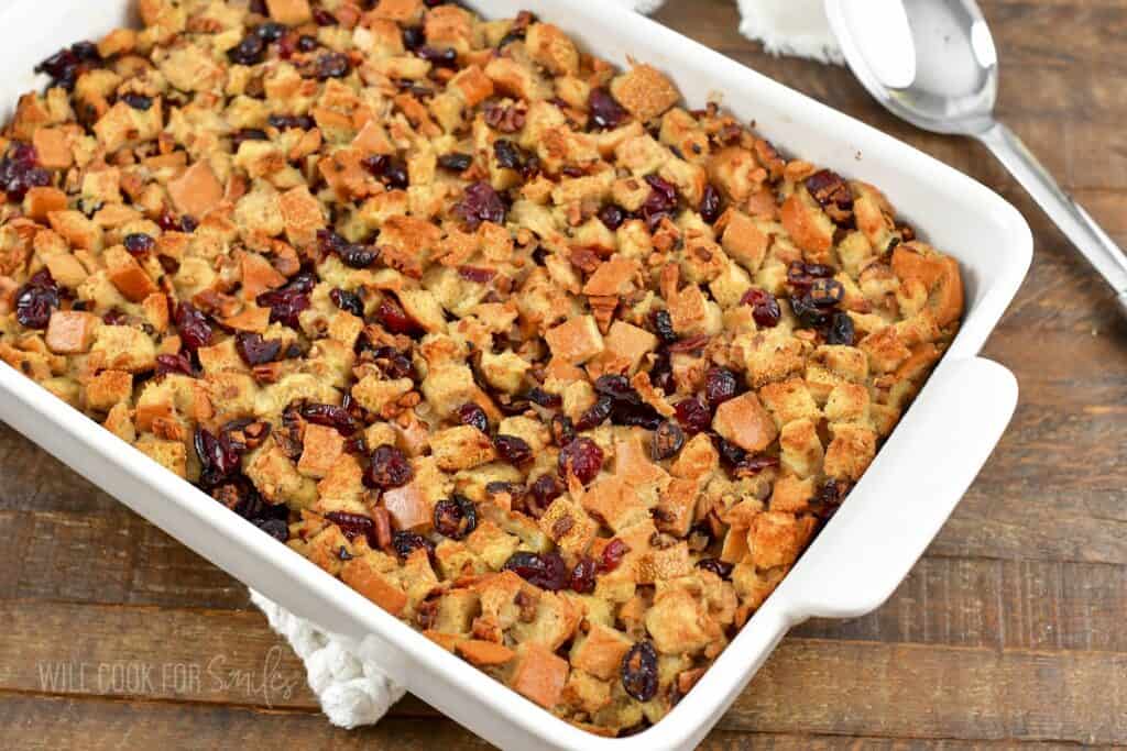 baked cranberry stuffing in a white baking dish.