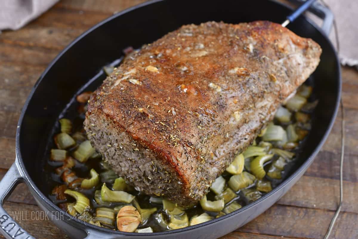 roasted pork loin in the roasting pan.