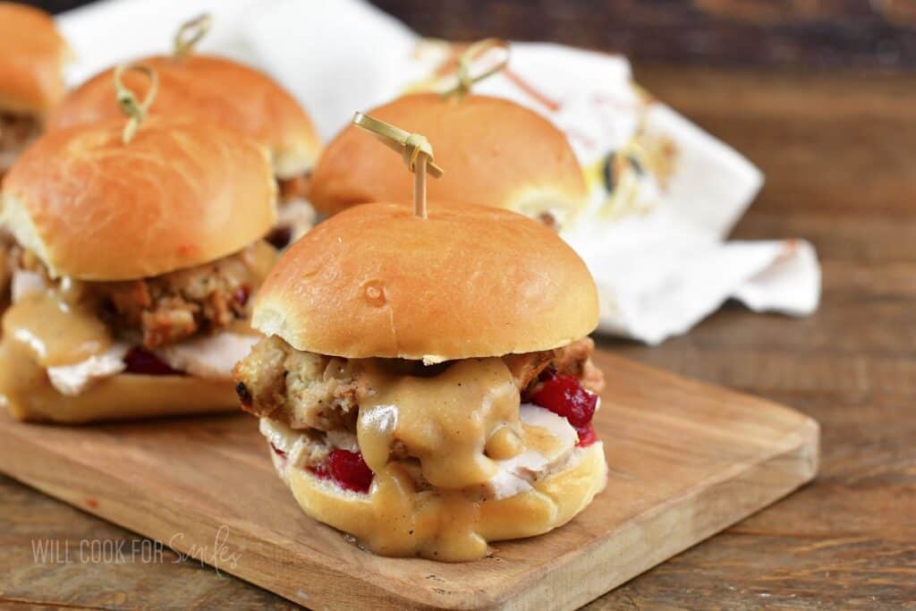 closeup of holiday leftover slider and gravy on the board.