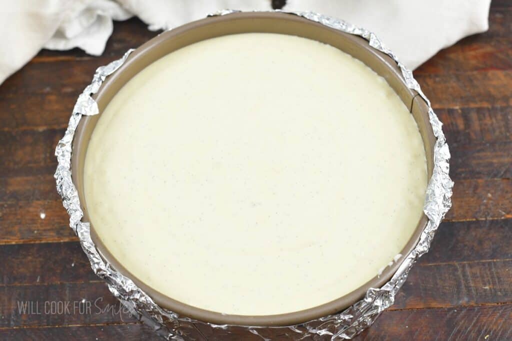 unbaked cheesecake in the springform pan.